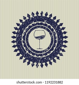 Blue wine cup icon inside distressed rubber grunge seal
