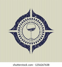 Blue wine cup icon inside distressed rubber texture