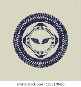 Blue wings icon inside distressed grunge seal