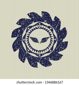 Blue wings icon inside rubber seal
