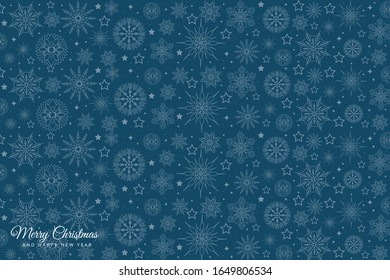 Blue winter abstract background. Christmas background with snowflakes