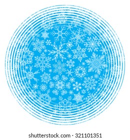 Blue winter background. Hand-drawn vintage snowflakes in the circle on blue background. 