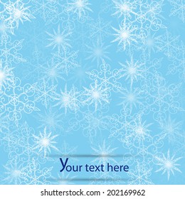 blue winter background with snowflakes