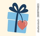 Blue winter gift box with heart tag