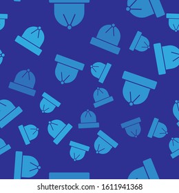 Blue Winter hat icon isolated seamless pattern on blue background.  Vector Illustration
