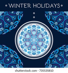 blue winter holiday card with ball and decorative ornamental shapes