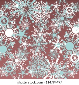 Blue winter pattern with snowflakes on a dark background.