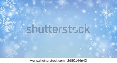 Blue winter sky background. Soft white snowflakes falling on a light blue gradient backdrop, glowing bokeh lights. Peaceful snowy landscape, wallpaper for holiday designs, banners, greeting cards.