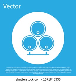 Blue Wooden barrels icon isolated on blue background. Alcohol barrel, drink container, wooden keg for beer, whiskey, wine. White circle button. Vector Illustration
