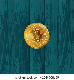 Blue wooden parquet or laminate texture with golden bitcoin coin