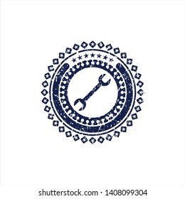 Blue wrench icon inside distress rubber grunge seal