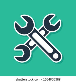 Blue Wrench icon isolated on green background. Spanner icon.  Vector Illustration