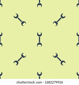 Icono de la llave inglesa azul aislado sin fisuras en fondo amarillo. Ilustración vectorial
