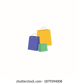 Blue, yellow and green package with craft handles made of eco-friendly material for shopping