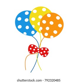 Blue, yellow, and orange polka dot balloons tied together with a red polka dot bow.