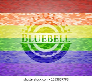 Bluebell emblem on mosaic background with the colors of the LGBT flag