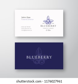 Blueberry Confectionary Abstract Elegant Vector Logo and Business Card Template. Hand Drawn Berries with Leafs. Premium Stationary Realistic Mock Up. Modern Typography and Soft Shadows. Isolated.