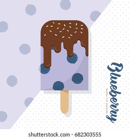 Blueberry popsicle. Healthy fruit popsicle with chocolate cream, jimmies sprinkles topping. Summer refreshing snack.