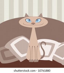 a blue-eyed oriental cat sitting on a sofa