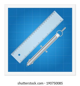 Blueprint and ruler instruments on a white background.