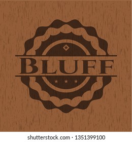 Bluff badge with wood background