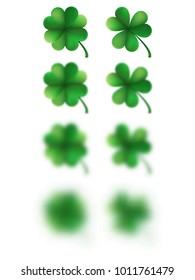 Blur green happy clover leafs isolated on white background. Saint Patricks day object. And also includes EPS 10 vector
