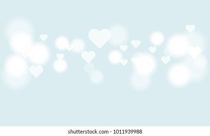 Blur heart bokeh for Valentines day holiday background. Luxury white light-colored.