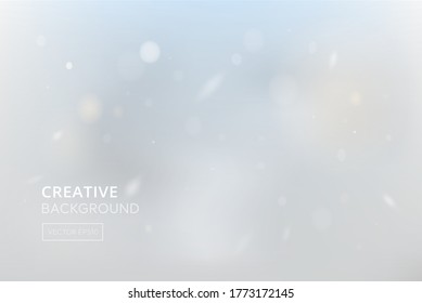 Blur winter sky abstract background with white snowfall bokeh