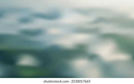 Blurred abstract image with soft blue, green, and white tones, resembling a foggy landscape or water.