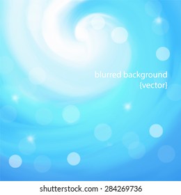 Blurred background with blue wave, stars and bokeh effect.