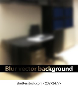 blurred background with a computer and a desk