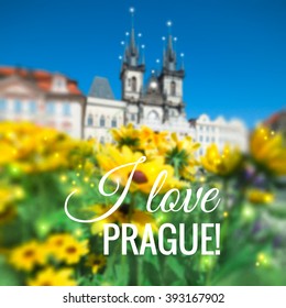 Blurred background with flowers in front of St. Mary's Church in Prague, caption "I love Prague", space for your text. This is vector file saved as Eps10, made with mesh