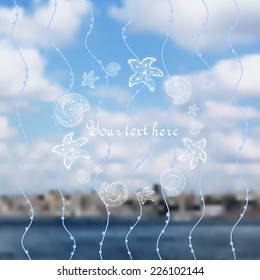 blurred background with frame with seashells and starfish