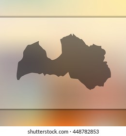 Blurred background with silhouette of Latvia map. Vector silhouette of Latvia map
