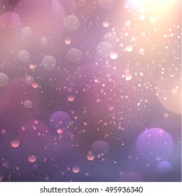 blurred background with soft lilac colors and fine sparkles of light.
