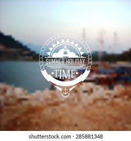 Blurred background with Summer holidays logo