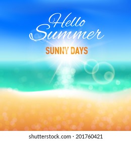 Blurred background with sunny beach for your summer design
