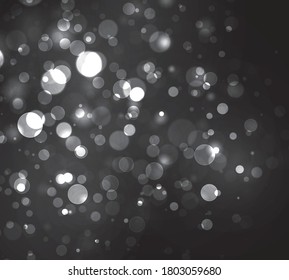 Blurred bokeh light on black background. Christmas and New Year holidays template. Abstract silver glitter defocused blinking stars and sparks. Vector EPS 10