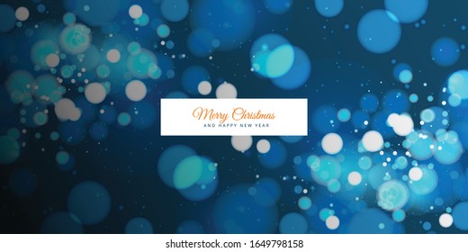 Luz de boquilla borrosa sobre fondo azul oscuro. Plantilla de vacaciones de Navidad y Año Nuevo.Brillante abstracto desenfocado estrellas y chispas parpadeantes.
