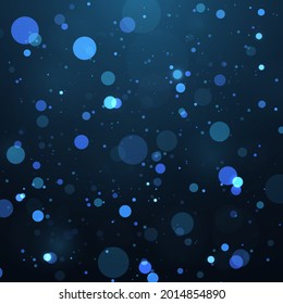 Luz de bokeh borrosa sobre fondo oscuro. El brillo abstracto desenfocó estrellas y chispas parpadeantes.