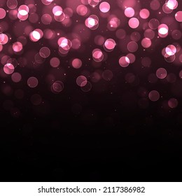 Blurred bokeh light on dark background. Abstract glitter defocused pink blinking stars and sparks.