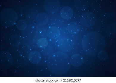 Blurred bokeh light on dark blue background