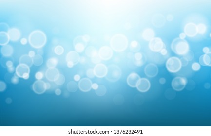 Blurred bright abstract bokeh on blue background. Vector illustration.