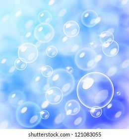 Blurred bubbles over a blue background