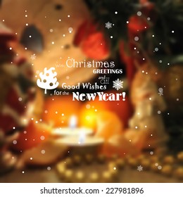Blurred christmas background with lights, candles, snowflakes.