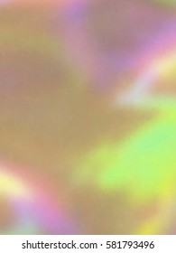 Blurred defocused holographic background. Grain spotted surface. Trendy digital noise. Abstract composition, vector EPS10. Not trace image, include mesh gradient only
