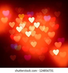 Blurred defocused lights background with hearts