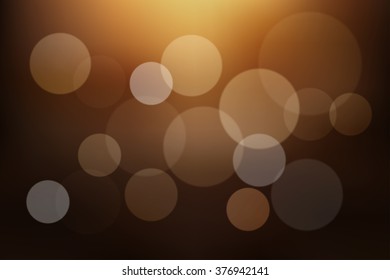 Blurred gold background with bokeh.
