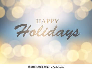 Blurred light gold bokeh abstract background with happy holidays lettering