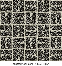 Blurred pattern with simple shapes placed in rectangles. Carpet texture. Tapestry. Grid. Vector illustration. 